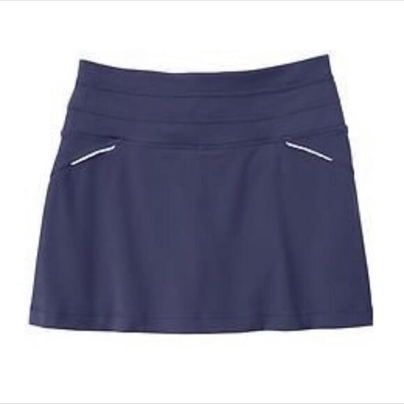 Athleta Relay Skort in navy with a slight purple hue - Picture 1 of 7